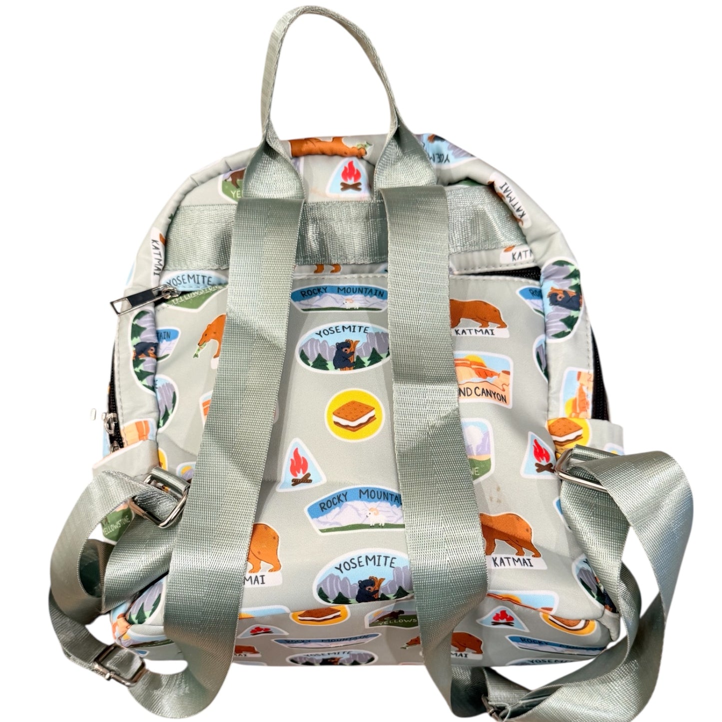 Backpack with camping-themed design on a white background
