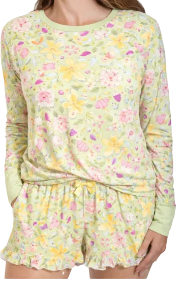 Floral pajama set with long-sleeve top and shorts on a plain background