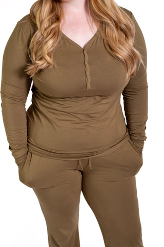 Brown long-sleeve top and pants set on a white background
