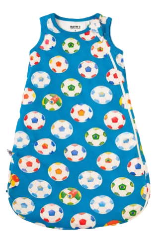 Children's sleeping bag with soccer ball pattern on a blue background