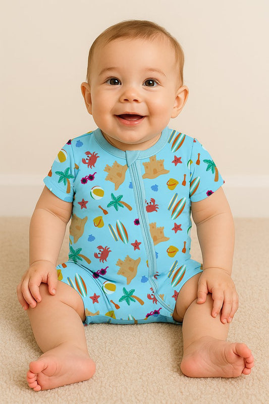 Baby wearing a colorful swimsuit with sea-themed design on a beige background