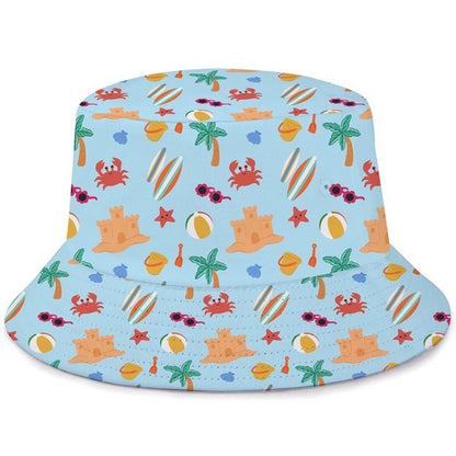 Bucket hat with beach-themed pattern on a light blue background