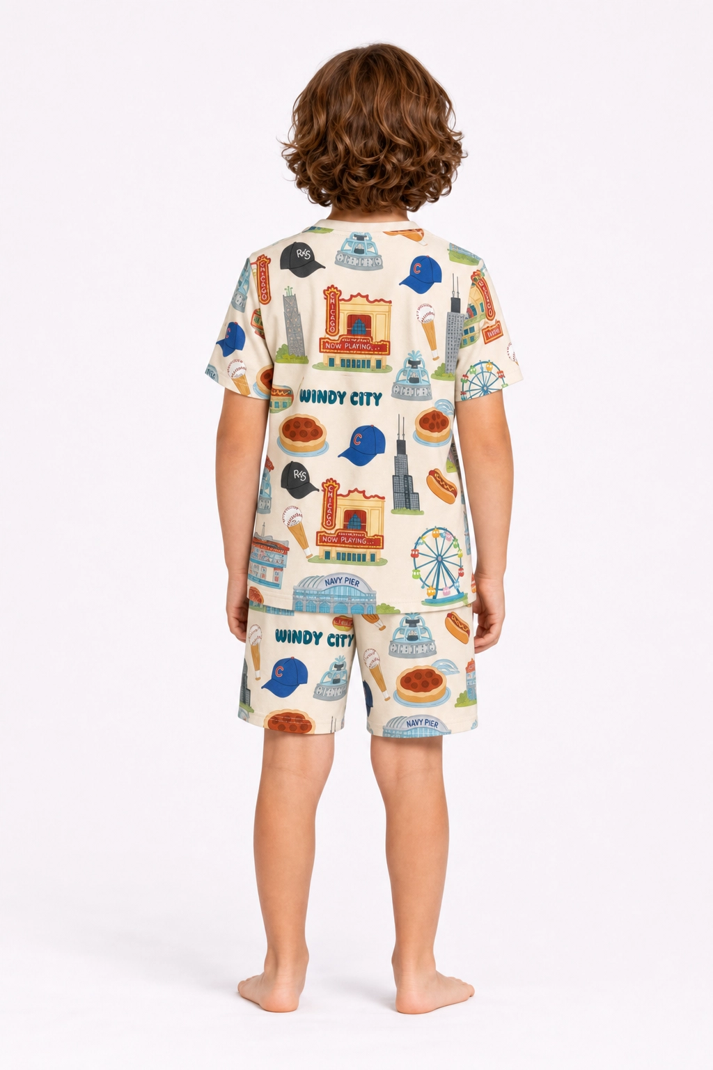 Kids wearing Windy City Chicago bamboo pajama set with oversized shirt and drawstring shorts featuring Chicago skyline, Navy Pier, and deep dish pizza artwork