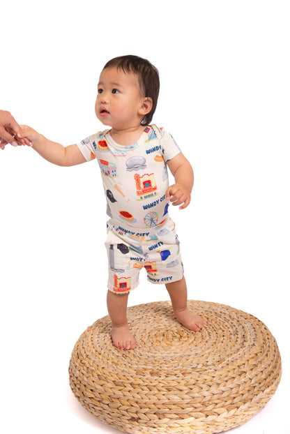 A buttery soft bamboo baby short set featuring a hidden snap bodysuit underneath for easy cuddles, secure comfort, and adorable Chicago-inspired style.