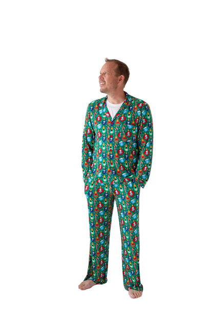 Man wearing a green floral pajama set against a white background