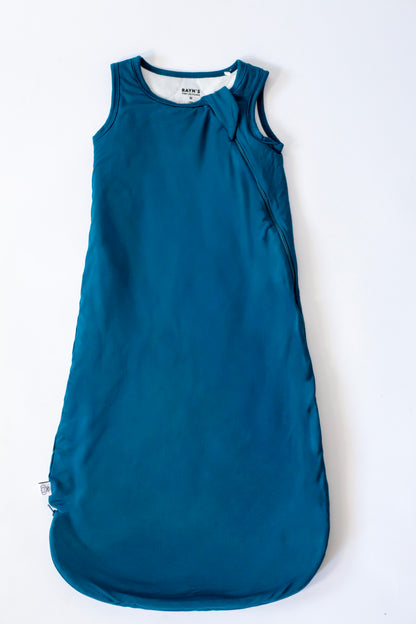 Blue sleeveless dress on a white background