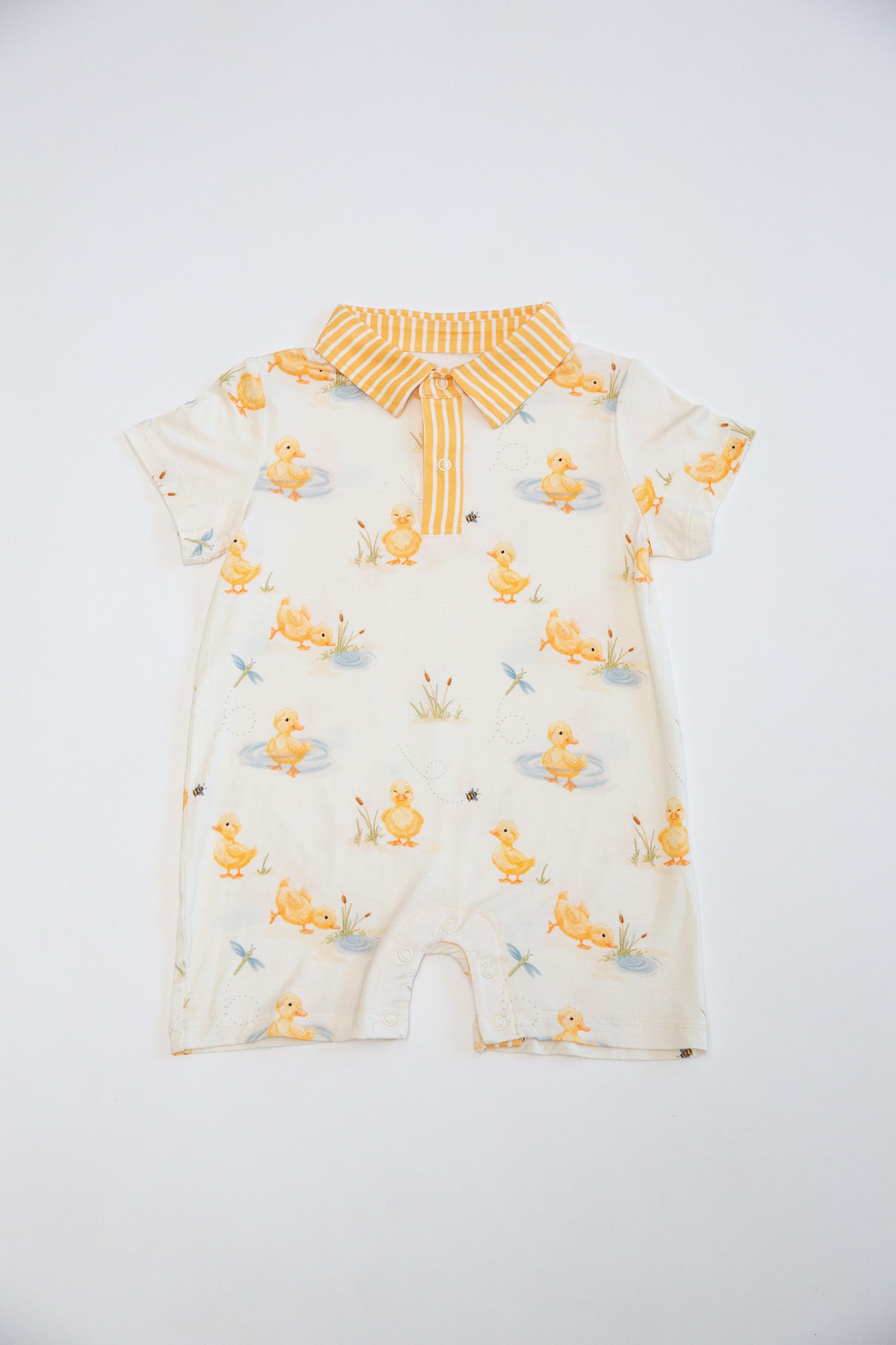 Baby romper with duck pattern on a white background