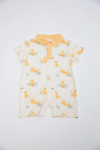 Baby romper with duck pattern on a white background