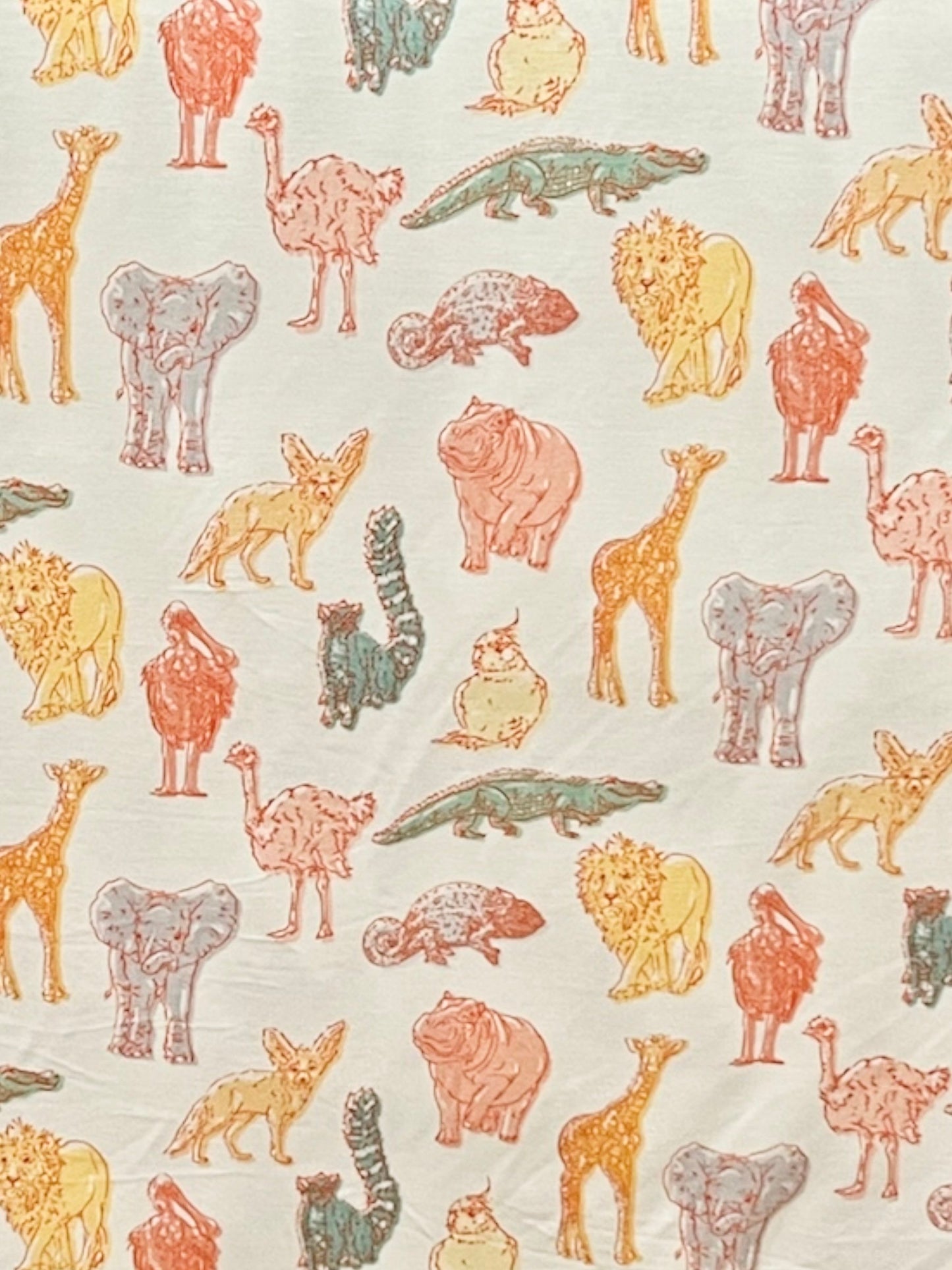 Pattern of colorful animal illustrations on a light background