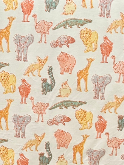 Pattern of colorful animal illustrations on a light background