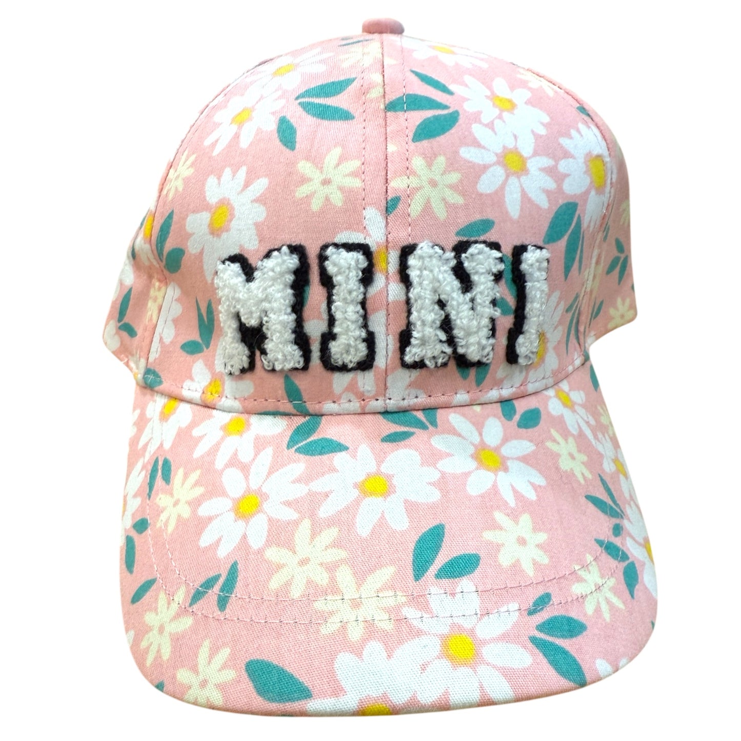 Floral-patterned cap with 'MIMI' text on a white background