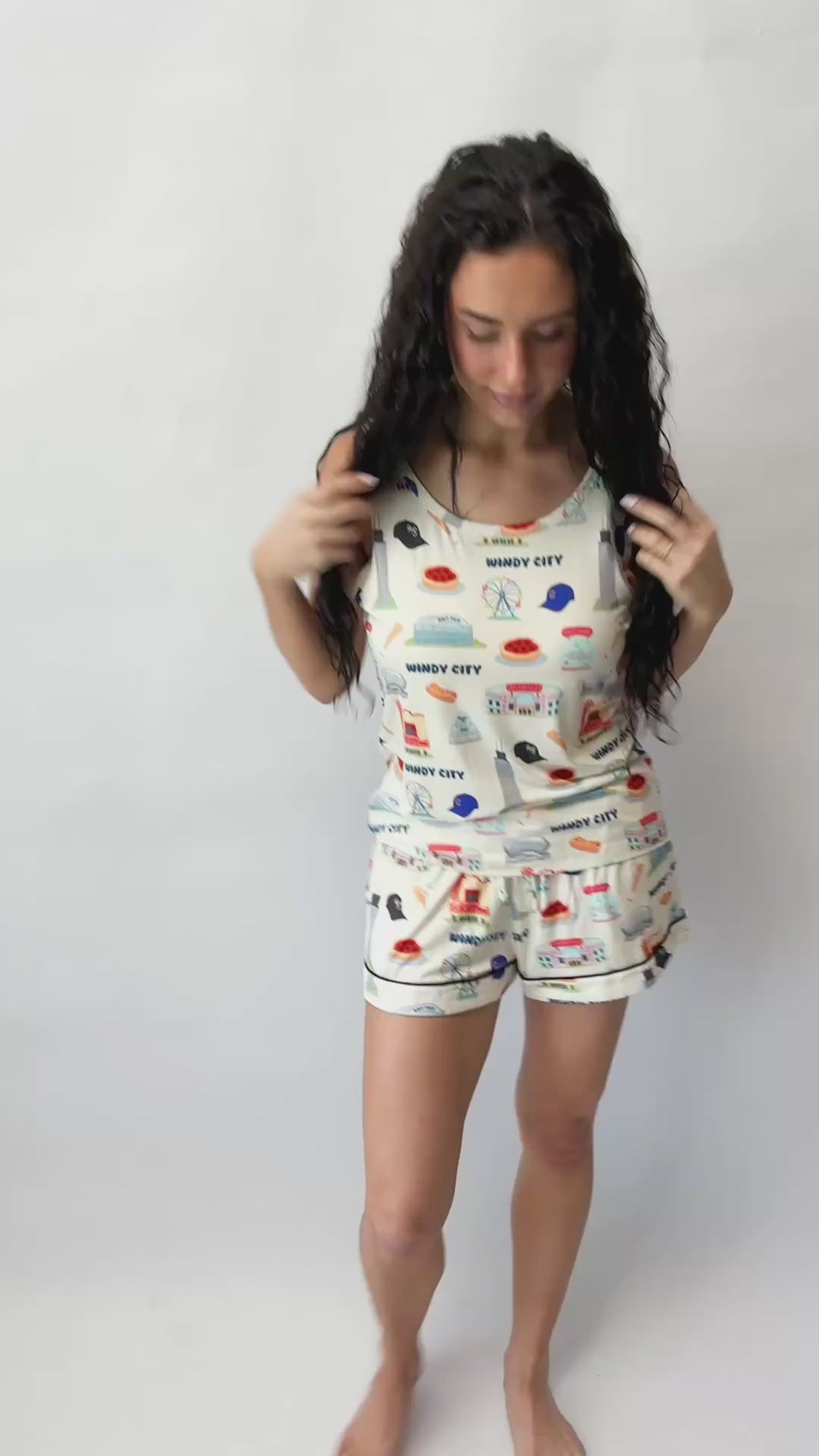 A buttery soft bamboo tank and shorts pajama set featuring cooling temperature-regulating fabric, adjustable drawstring shorts, and cozy Chicago-inspired artwork for luxurious sleep.