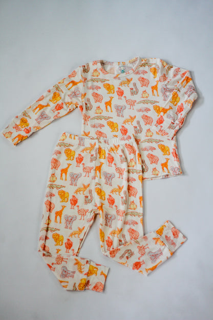 Children's pajama set with animal pattern on a white background