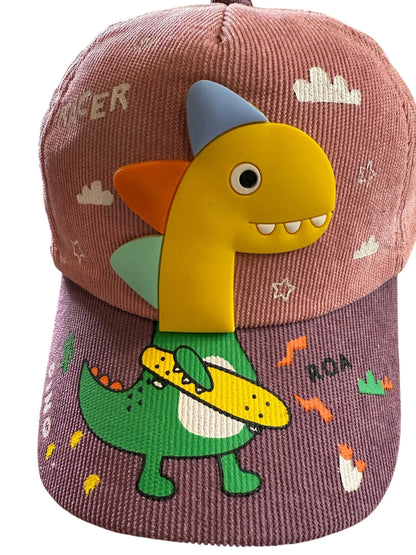 Children's cap with a dinosaur design on a pink background