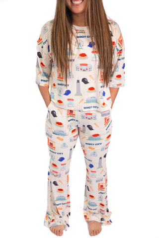 A buttery soft bamboo pajama set featuring an oversized short sleeve top, flare pants, and cooling temperature-regulating comfort inspired by cozy Chicago memories.